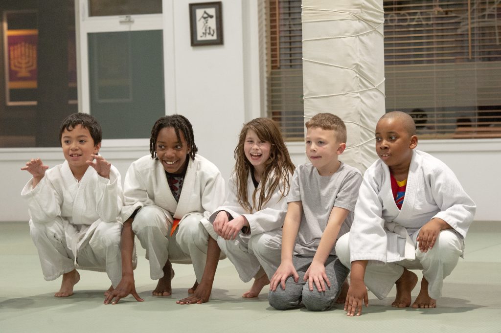 Kids learning martial arts Kids learning martial arts